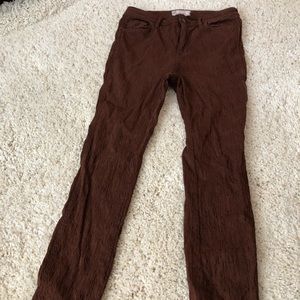 Free people brownish printed skinny jeans. Size 27